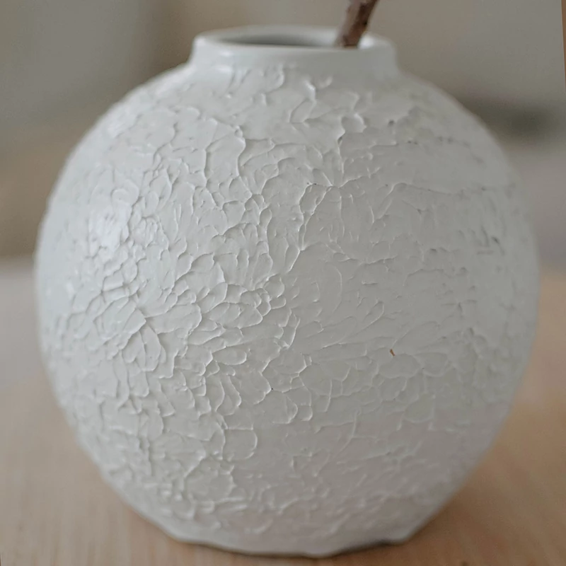 fehér gömb váza